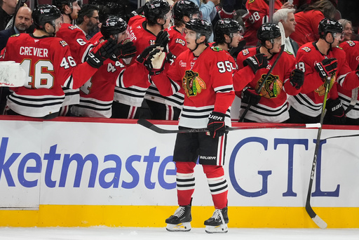 Chicago Blackhawks right wing Ilya Mikheyev (95) celebrates after his goal against the Utah Mammoth during the second period of an NHL hockey game Monday, Oct. 13, 2025, in Chicago. (AP Photo/Erin Hooley) Chicago Blackhawks right wing Ilya Mikheyev (95) celebrates after his goal against the Utah Mammoth during the second period of an NHL hockey game Monday, Oct. 13, 2025, in Chicago. (AP Photo/Erin Hooley)