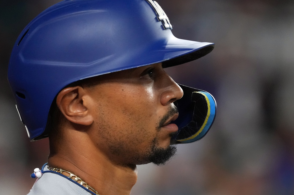 Los Angeles Dodgers shortstop Mookie Betts (50) against the Arizona Diamondbacks in the first inning of a baseball game, Friday, Aug 7, 2026, in Phoenix. (AP Photo/Rick Scuteri)