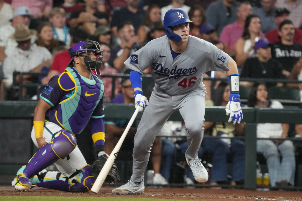 Los Angeles Dodgers catcher Hunter Feduccia (46) against the Arizona Diamondbacks in the first inning of a baseball game, Friday, Aug 7, 2026, in Phoenix. (AP Photo/Rick Scuteri)