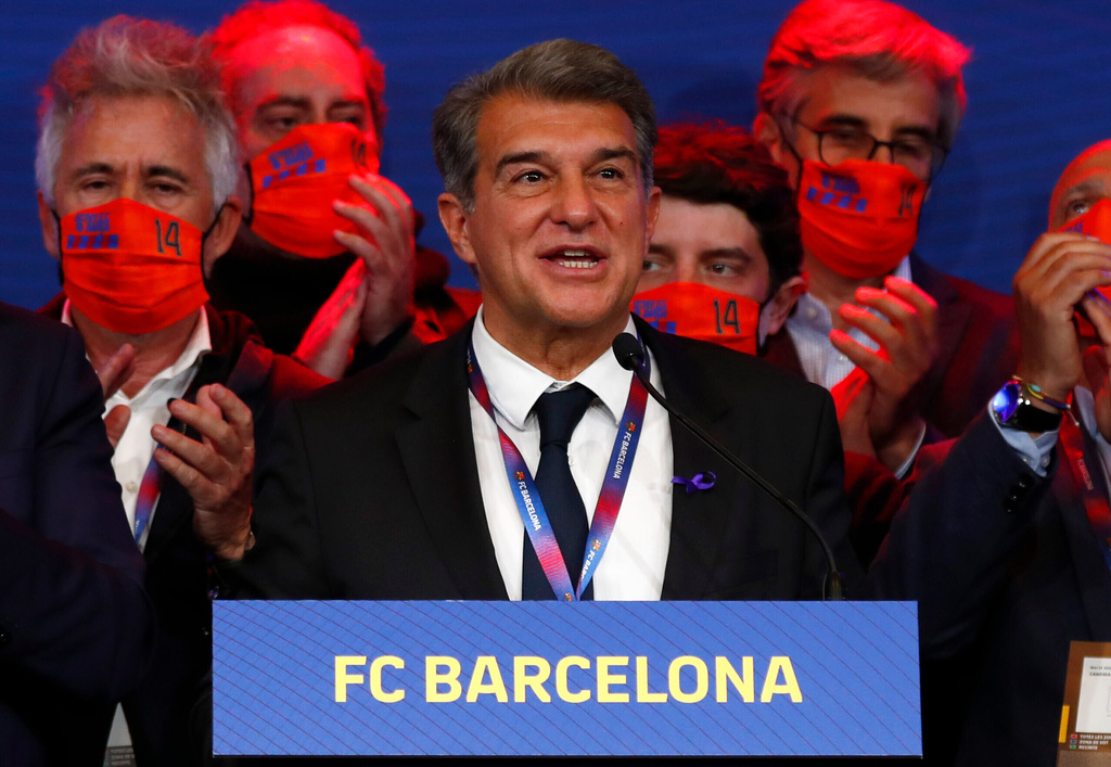 FILE - Joan Laporta celebrates his victory after elections at the Camp Nou stadium in Barcelona, Spain, on March 7, 2021. (AP Photo/Joan Monfort, File)
