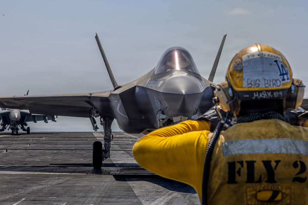 This image provided by U.S. Central Command shows a F-35C Lightning II preparing for launch on the flight deck of the USS Abraham Lincoln (CVN 72) in support of Operation Epic Fury on Monday, March 2, 2026. (U.S. Navy via AP)