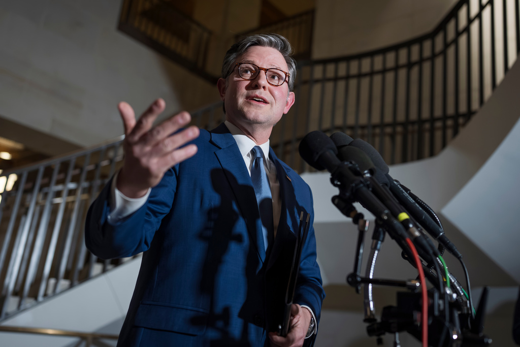 Speaker of the House Mike Johnson, R-La., answers questions from reporters following a closed-door briefing from Secretary of State Marco Rubio, Defense Secretary Pete Hegseth, and others about the U.S. military operation in Venezuela ordered by President Donald Trump, at the Capitol in Washington, Monday, Jan. 5, 2026. (AP Photo/J. Scott Applewhite)