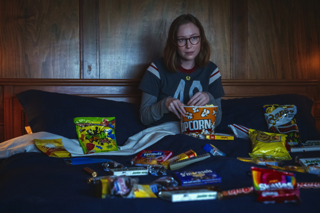 This image released by Mubi shows Hannah Einbinder in a scene from "Teenage Sex and Death at Camp Miasma." (Ryan Plummer/Mubi via AP)