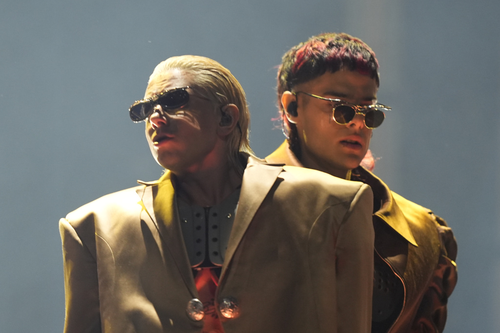 FILE - CA7RIEL, right, and Paco Amoroso perform in Mexico City on Aug. 15, 2025. (AP Photo/Fernando Llano, File)