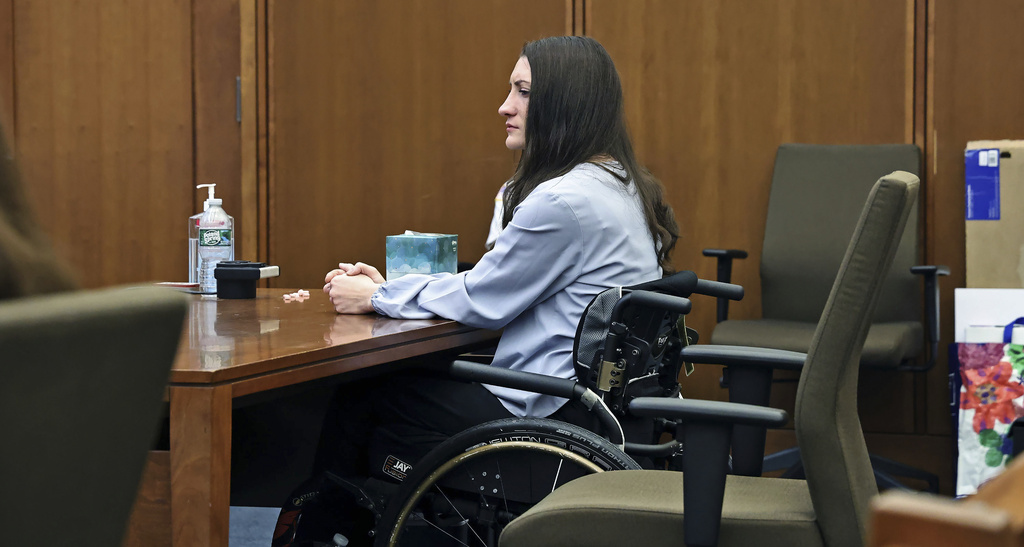 Lindsay Clancy sits at the defense table as Kevin Reddington asks the jury to find her not guilty during her murder trial at Plymouth Superior Court in Plymouth, Mass., Thursday, Aug. 27, 2026. (Greg Derr/The Patriot Ledger via AP, Pool)