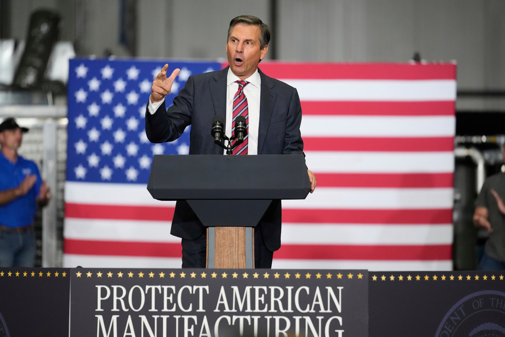 FILE - Republican U.S. Senate candidate Derek Dooley speaks ahead of Vice President JD Vance during a visit to ALTA Refrigeration Inc., Aug. 21, 2025, in Peachtree City, Ga. (AP Photo/Brynn Anderson, File)