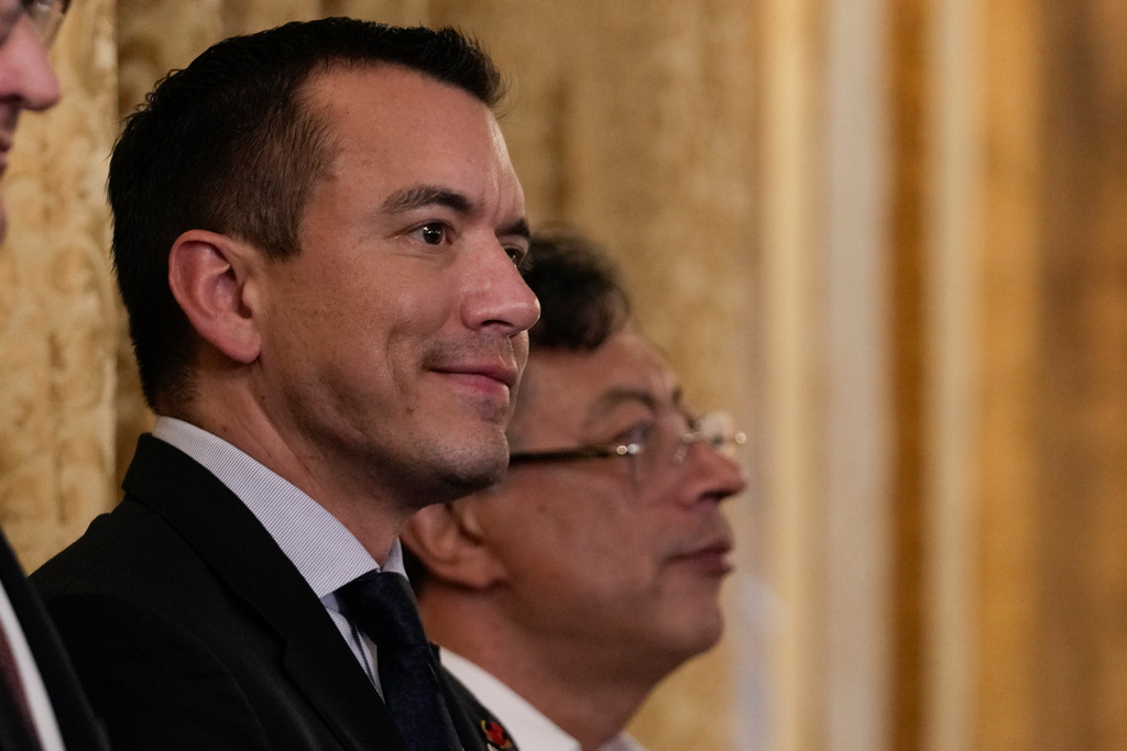 Ecuadorian President Daniel Noboa, left, and Colombian President Gustavo Petro attend a decoration ceremony for Brazilian President Luiz Inacio Lula da Silva at the presidential palace in Panama City, Wednesday, Jan. 28, 2026. (AP Photo/Matias Delacroix)