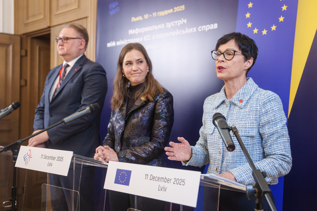 EU Commissioner for Enlargement Marta Kos, right, attends a joint press conference with Ukraine's Deputy Prime Minister for European and Euro-Atlantic Integration of Ukraine Taras Kachka, left, and Marie Bjerre, Danish Minister for European Affairs, after informal meeting of EU ministers for European affairs in Lviv, Ukraine, on Thursday, Dec. 11, 2025. (AP Photo/Evgeniy Maloletka)