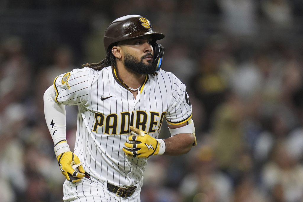 San Diego Padres' Fernando Tatis Jr. watches his flyout during the fifth inning of a baseball game against the Baltimore Orioles Tuesday, Sept. 2, 2025, in San Diego. (AP Photo/Gregory Bull)