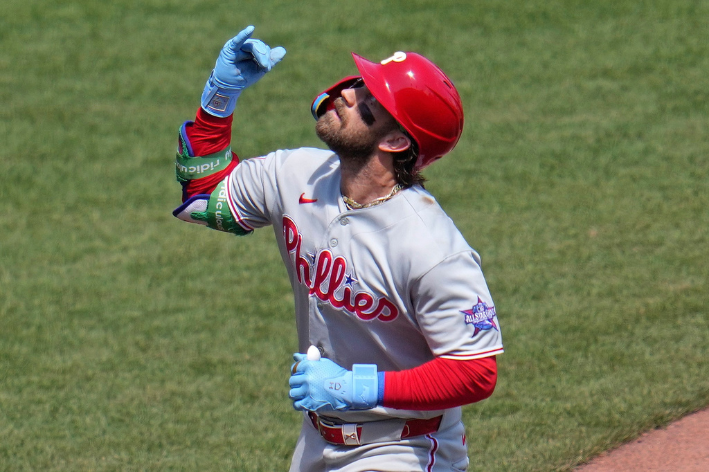 Philadelphia Phillies' Bryce Harper celebrates as he rounds the bases after hitting a solo home run off Pittsburgh Pirates pitcher Paul Skenes during he sixth inning of a baseball game in Pittsburgh, Sunday, May 17, 2026. (AP Photo/Gene J. Puskar)