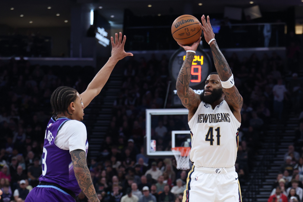 New Orleans Pelicans guard Saddiq Bey (41) goes up for a 3-point shot over Utah Jazz guard Keyonte George (3) during the first half of an NBA basketball game, Saturday, Feb. 28, 2026, in Salt Lake City. (AP Photo/Rob Gray)