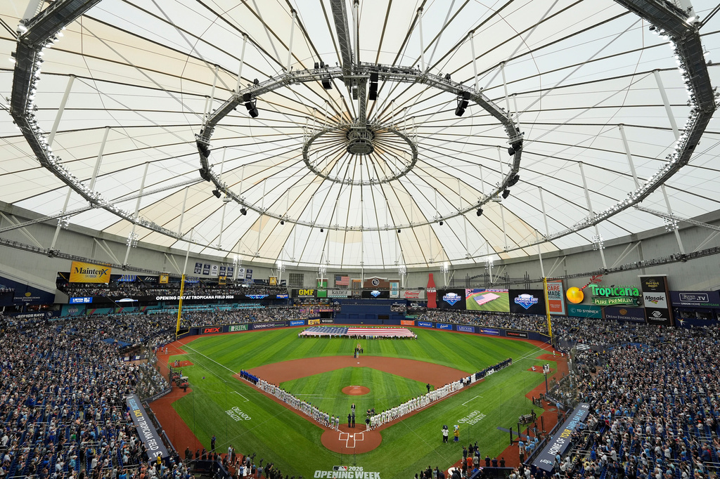 FILE - Players from the Chicago Cubs and Tampa Bay Rays are introduced before a baseball game Monday, April 6, 2026, in St. Petersburg, Fla. (AP Photo/Chris O'Meara, File)