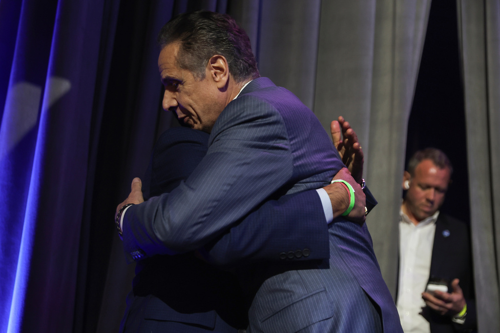 Andrew Cuomo hugs a supporter after conceding the mayoral race to Zohran Mamdani, Tuesday, Nov. 4, 2025, in New York. (AP Photo/Heather Khalifa)