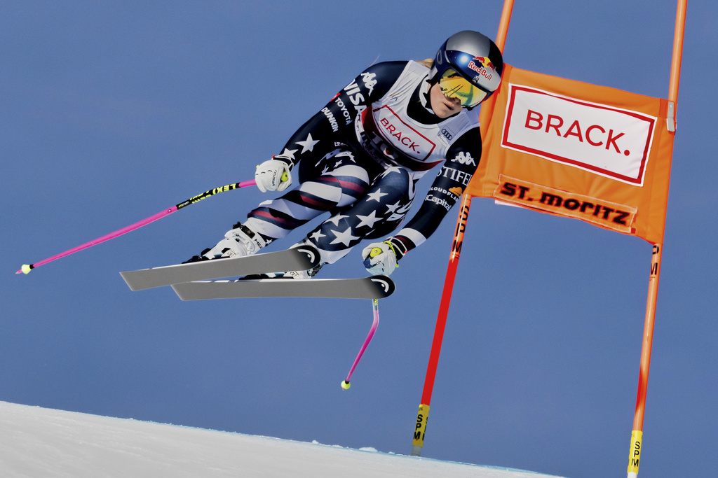 United States' Lindsey Vonn competes in an alpine ski, women's World Cup downhill in St. Moritz, Switzerland, Friday, Dec.12, 2025. (Jean-Christophe Bott/Keystone via AP)