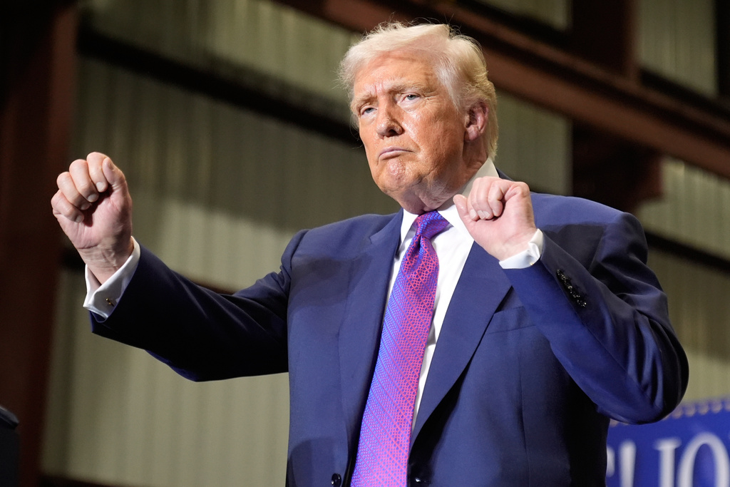 President Donald Trump dances after speaking at Coosa Steel Corporation in Rome, Ga., Thursday, Feb. 19, 2026. (AP Photo/Mark Schiefelbein)