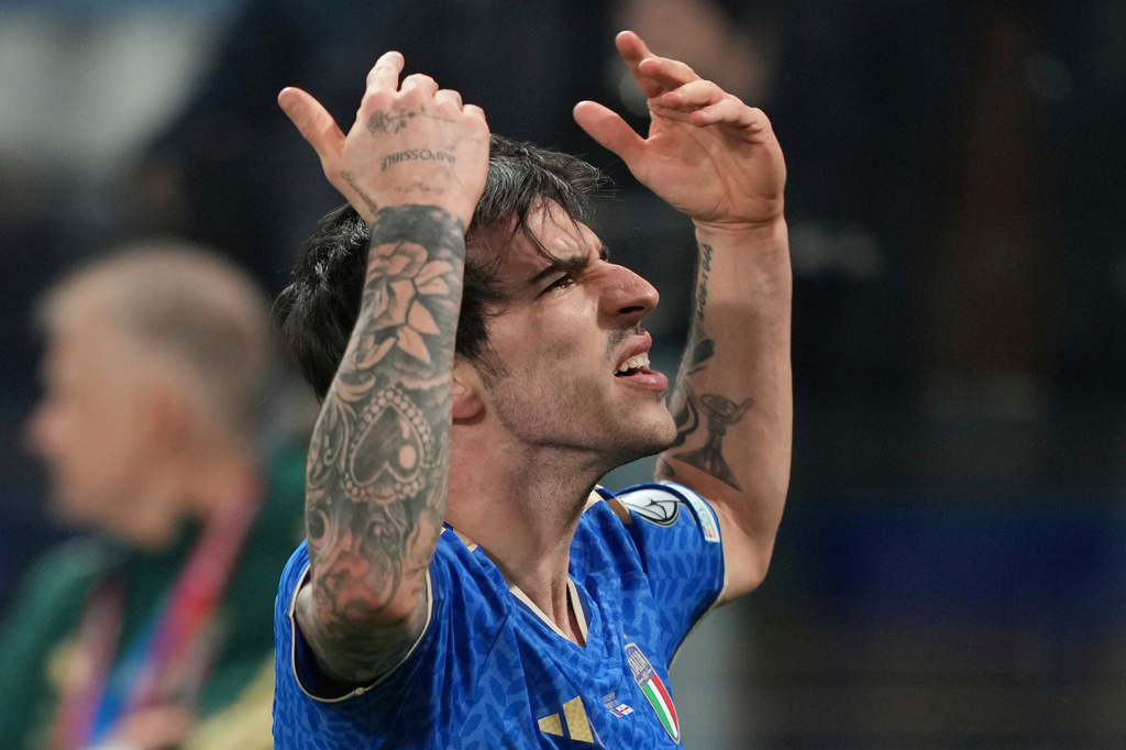 Italy's Sandro Tonali celebrates after scoring his side's first goal during the World Cup qualifying play-off soccer match between Italy and Northern Ireland, in Bergamo, Italy, Thursday, March 26, 2026. (AP Photo/Antonio Calanni)