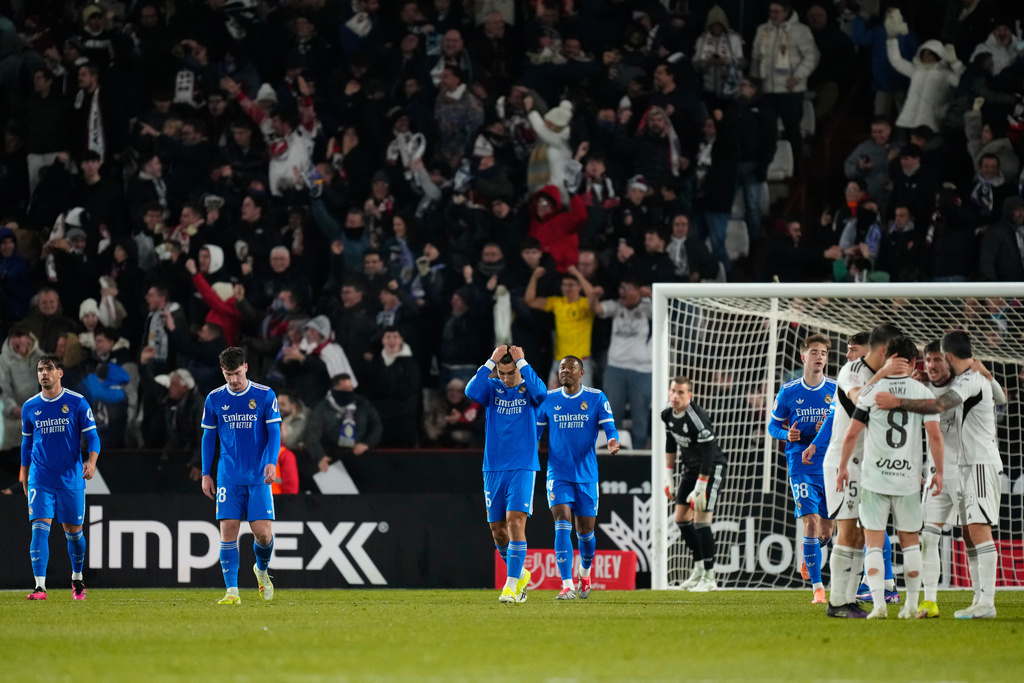 Real Madrid players react after Albacete scored its second goal during the Copa del Rey round of 16 soccer match between Albacete and Real Madrid, in Albacete, Spain, Wednesday, Jan. 14, 2026. (AP Photo/Jose Breton)