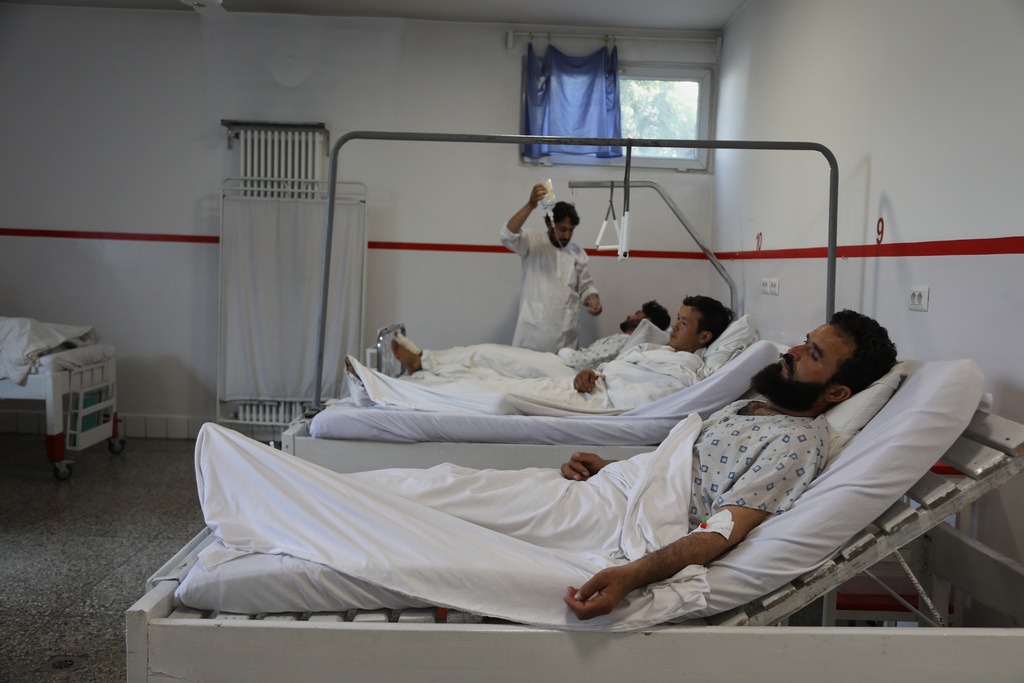 Wounded men from Wednesday's two drone strikes receive treatment at the Emergency Hospital, in Kabul, Afghanistan, Thursday, Oct. 16, 2025. (AP Photo/Siddiqullah Alizai)