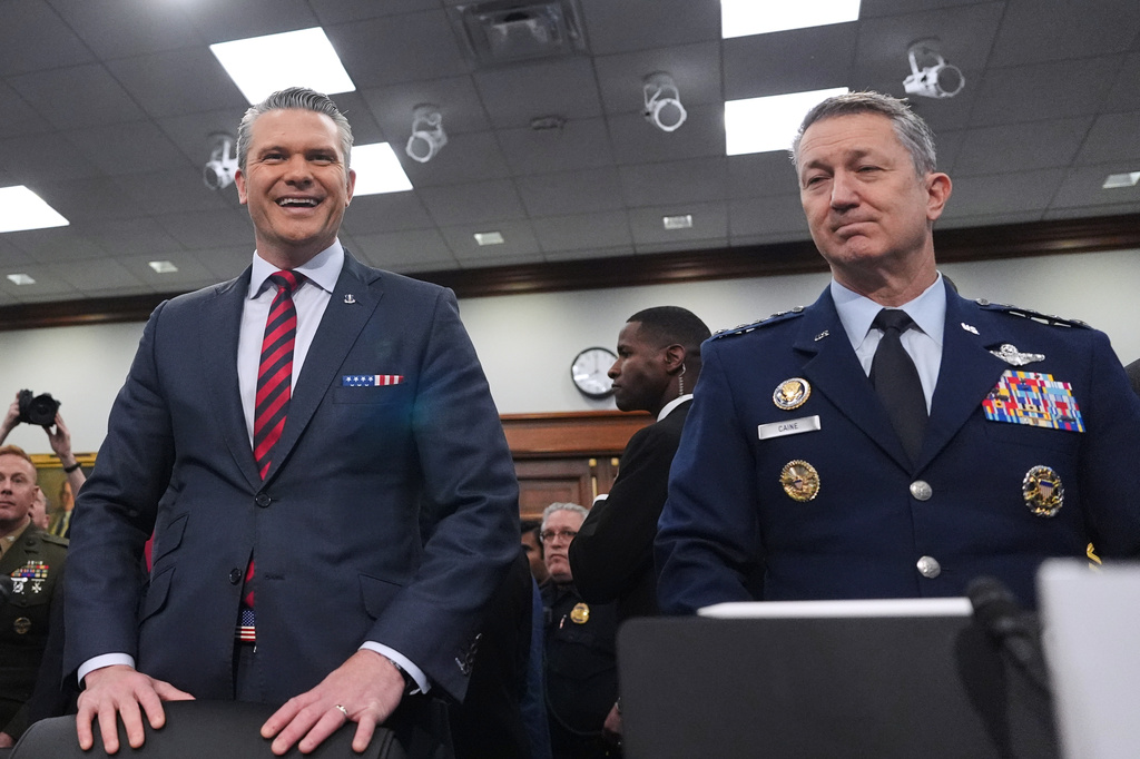 Defense Secretary Pete Hegseth and Chairman of the Joint Chiefs of Staff Gen. Dan Caine arrive to testify at a House Appropriations subcommittee budget hearing for the Department of Defense, Tuesday, May 12, 2026, in Washington. (AP Photo/Alex Brandon)