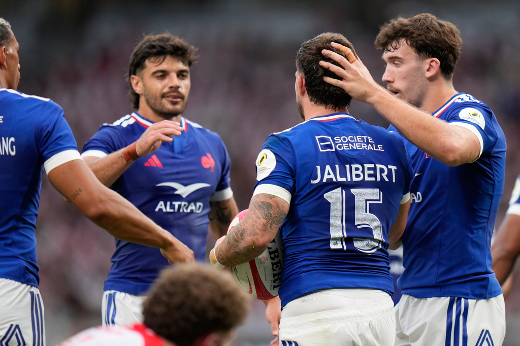 Teammates celebrate a try by France's Matthieu Jalibert, second from right, during a Nations Championship rugby match between Japan and France in Tokyo, Saturday, July 18, 2026. (AP Photo/Shuji Kajiyama)