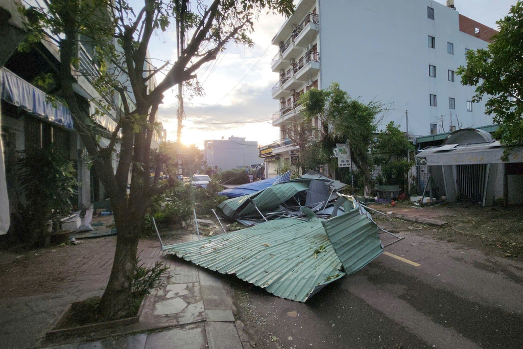 Debris sits on a road in Gai Lai, Vietnam, on Friday, Nov. 7, 2025 after Typhoon Kalmaegi lashed the country with fierce winds and torrential rains. (Sy Thang/VNA via AP)