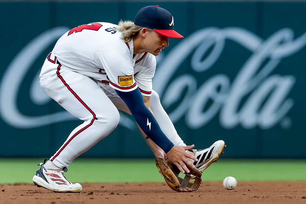 Atlanta Braves shortstop Jim Jarvis fields a groundout hit by San Diego Padres designated hitter Xander Bogaerts during the second inning of a baseball game, Monday, July 20, 2026, in Atlanta. (AP Photo/Erik S. Lesser)