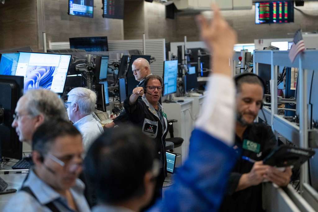 Options trader Anthony Spina works on the floor of the New York Stock Exchange, Monday, Aug. 17, 2026, in New York. (AP Photo/Yuki Iwamura)