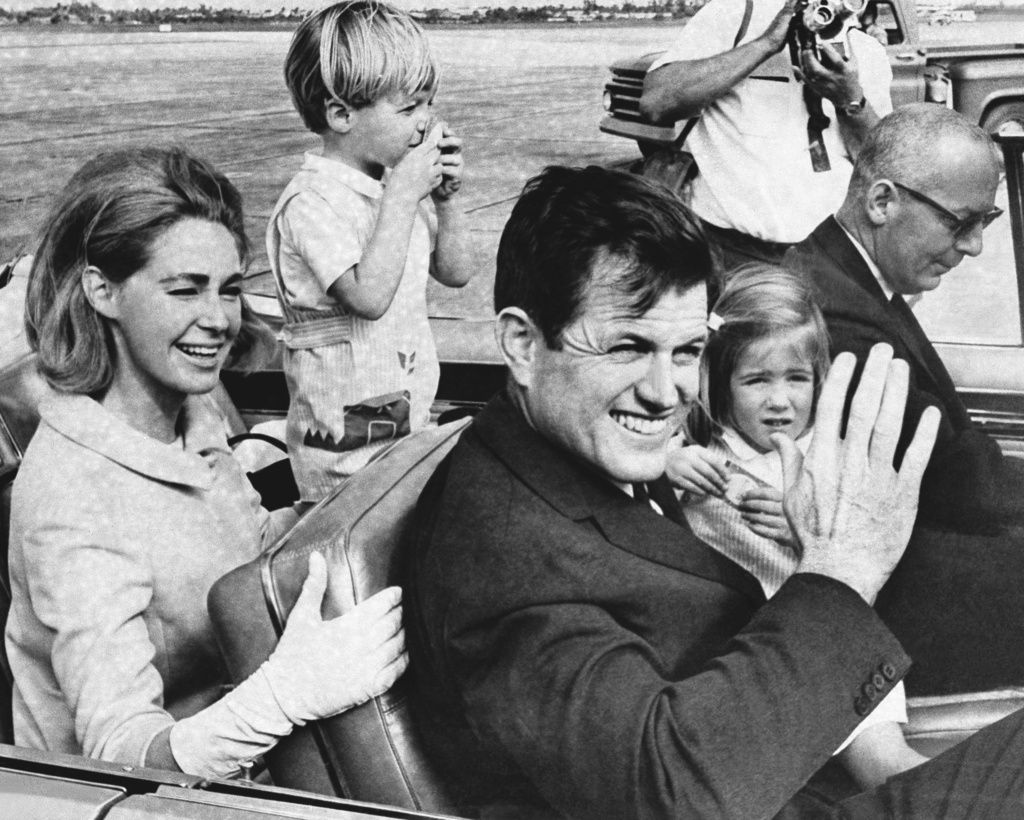 FILE - Senator Edward Kennedy and Wife Joan Kennedy leave West Palm Beach airport for the drive to his father's home and vacation at Palm Beach. . (AP Photo/FILE)