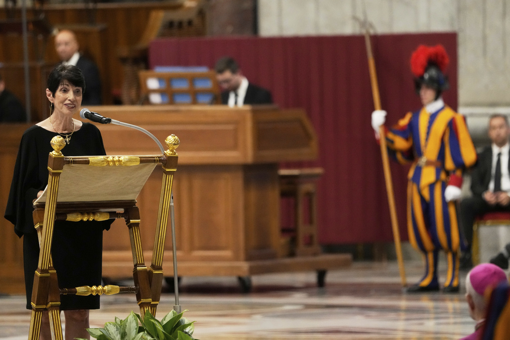 Diane Foley, the mother of James Foley, who was kidnapped and beheaded by Islamic militants in 2014 while reporting on the conflict in Syria, speaks as Pope Leo XIV presides over a vigil prayer for the consolation of those who suffer, at The Vatican, Monday, Sept. 15, 2025. (AP Photo/Gregorio Borgia)