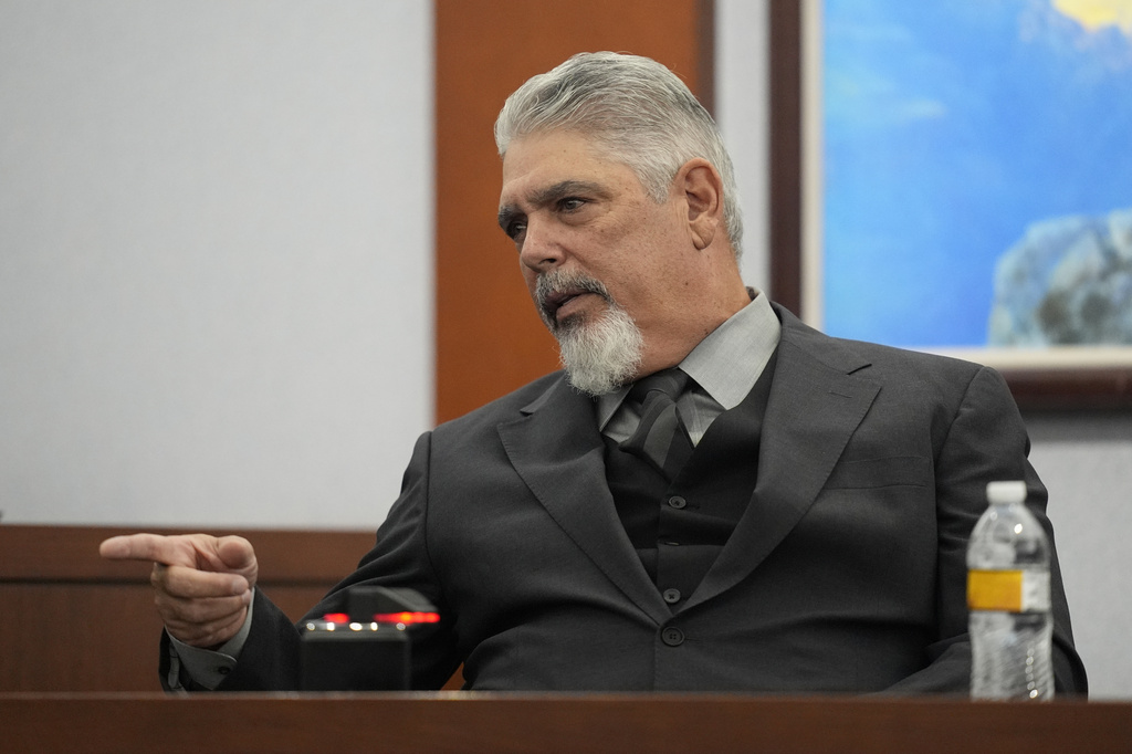 Robert Ladd, a former Compton, Calif., police officer who was part of the department's gang unit, testifies during the trial for Duane Davis, related to the 1996 killing of rapper Tupac Shakur, at Clark County District Court Regional Justice Center in Las Vegas, Tuesday, Aug. 25, 2026. (AP Photo/John Locher, Pool)