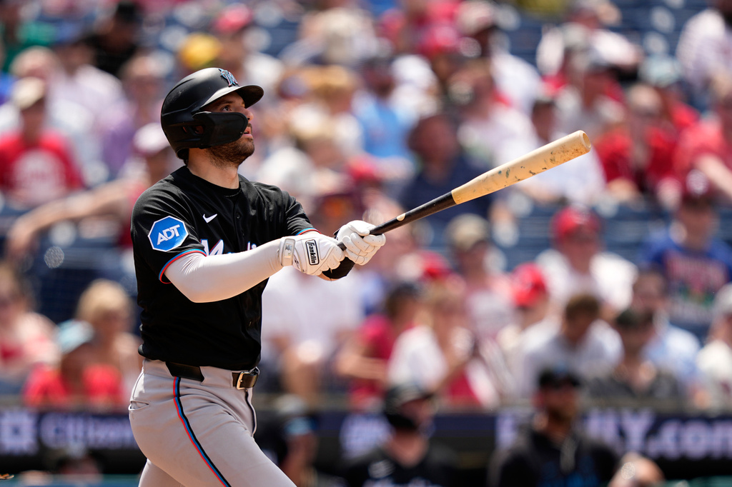 Miami Marlins' Joe Mack follows through after hitting a two-run home run against Philadelphia Phillies pitcher Tanner Banks during the sixth inning of a baseball game Wednesday, June 17, 2026, in Philadelphia. (AP Photo/Matt Slocum)