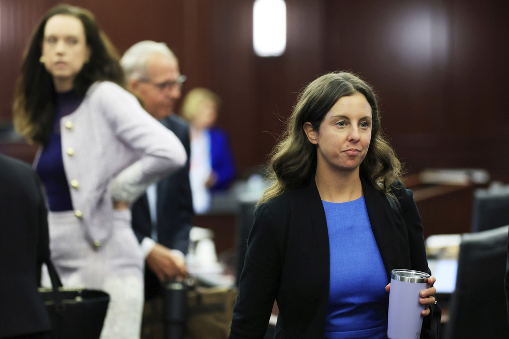 Assistant State Attorney Christina Stifler walks out at lunch recess after opening statements in the trial of Mario Fernandez Saldana at the Duval County Courthouse on Monday, Aug. 17, 2026, in Jacksonville, Fla. (Corey Perrine/The Florida Times-Union via AP, Pool)
