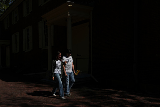 Newlywed couple, Emily Philbrook and Benjamin Barger, walk out of a worship service at the Quaker Arch Street Meeting House in Philadelphia on Oct. 5, 2025. (AP Photo/Luis Andres Henao) Newlywed couple, Emily Philbrook and Benjamin Barger, walk out of a worship service at the Quaker Arch Street Meeting House in Philadelphia on Oct. 5, 2025. (AP Photo/Luis Andres Henao)