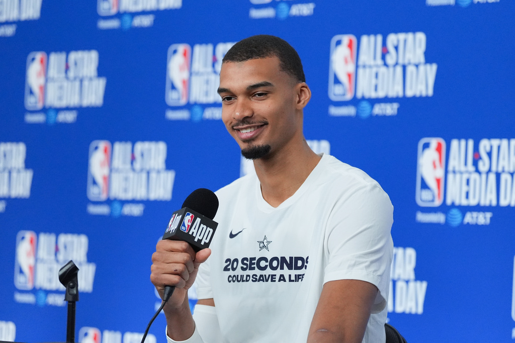 San Antonio Spurs' Victor Wembanyama talks to reporters during the NBA All-Star basketball game media day Saturday, Feb. 14, 2026, in Inglewood, Calif. (AP Photo/Jae C. Hong)