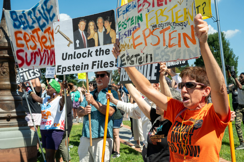 Protesters rally at a news conference calling for Congress to release all of the Jeffrey Epstein files, outside the U.S. Capitol, Wednesday, Sept. 3, 2025 in Washington. (AP Photo/Kevin Wolf)