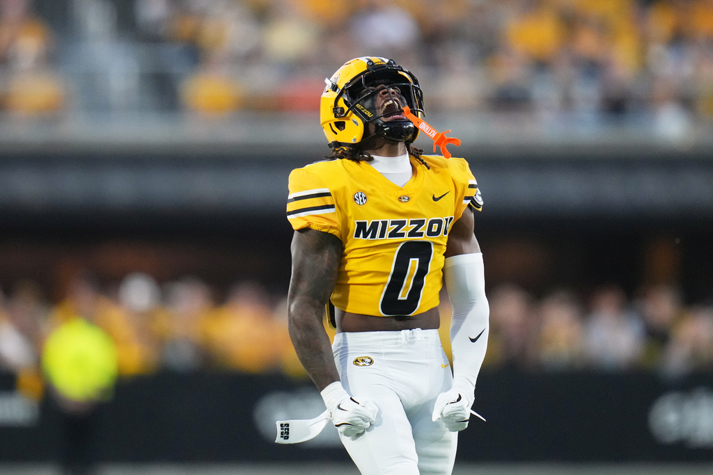Missouri cornerback Stephen Hall celebrates after breaking up a pass during the first half of an NCAA college football game against Massachusetts Saturday, Sept. 27, 2025, in Columbia, Mo. (AP Photo/Jeff Roberson)