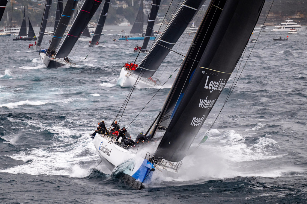 In this photo provided by the Cruising Yacht Club of Australia, LawConnect leads all competitors after the start in the Sydney Hobart yacht race in Sydney, Friday, Dec. 26, 2025. (Kurt Arrigo/CYCA via AP)