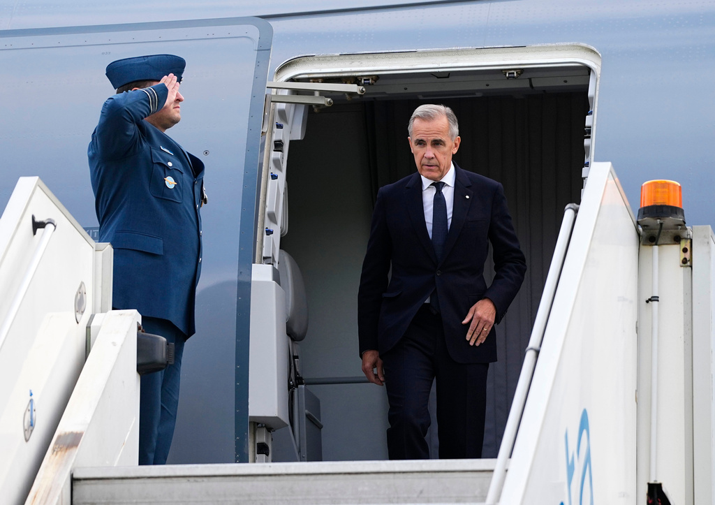 Canada's Prime Minister Mark Carney arrives in Manchester, England, Wednesday, Sept. 16, 2026, heading for Liverpool where he will meet with Britain's Prime Minister Andy Burnham. (Justin Tang/The Canadian Press via AP)