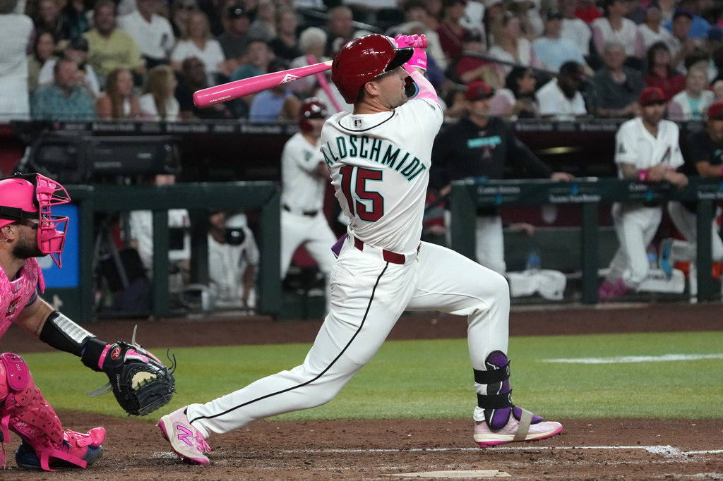 Arizona Diamondbacks' Ryan Waldschmidt hits an RBI single against the New York Mets in the sixth inning of a baseball game, Sunday, May 10, 2026, in Phoenix. (AP Photo/Rick Scuteri)