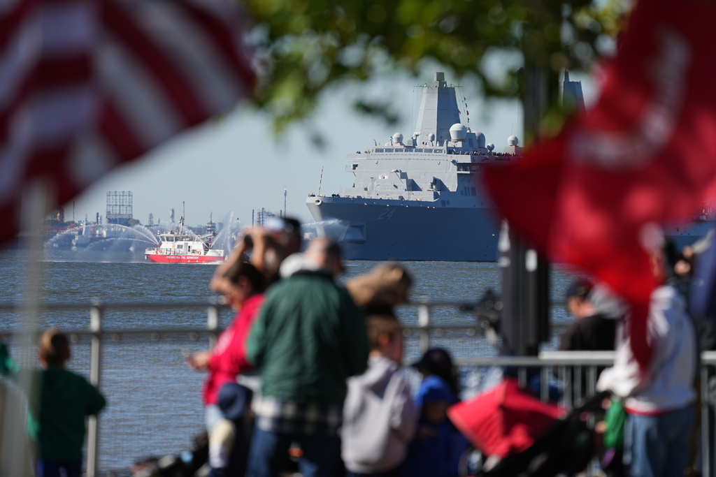 USS Billings passes the viewing stand during the 250th anniversary of the founding of the U.S. Navy and Marine Corps, along the Delaware River, Thursday, Oct. 9, 2025, in Philadelphia. (AP Photo/Matt Rourke)
