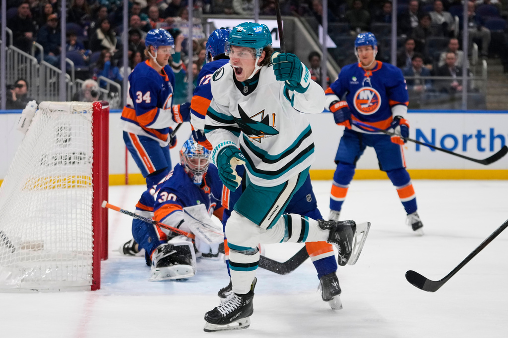 San Jose Sharks' Adam Gaudette (81) celebrates after scoring a goal during the first period of an NHL hockey game against the New York Islanders Tuesday, Oct. 21, 2025, at UBS Arena in Elmont, N.Y. (AP Photo/Frank Franklin II)