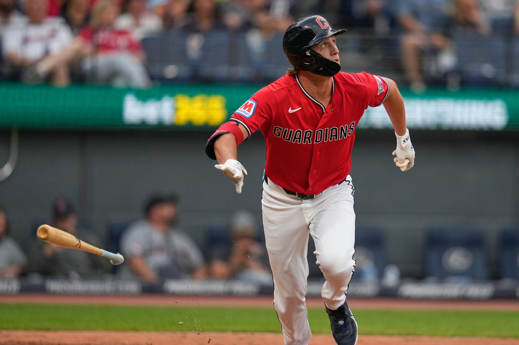 Cleveland Guardians' Petey Halpin drops his bat as he watches his home run in the fourth inning of a baseball game against the Minnesota Twins in Cleveland, Monday, July 20, 2026. (AP Photo/Sue Ogrocki)