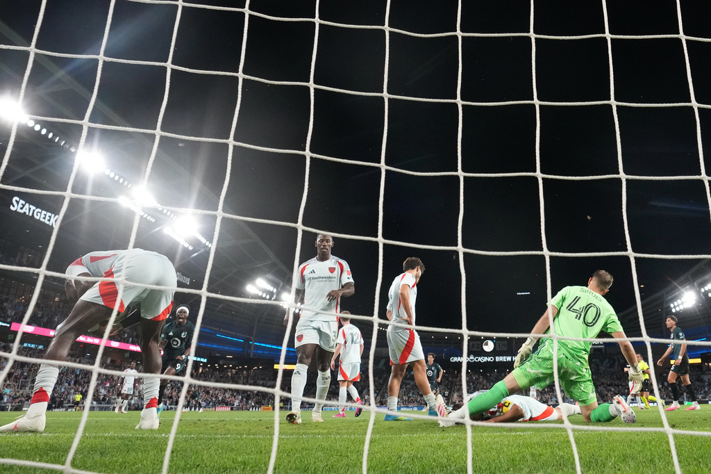 FC Dallas goalkeeper Jonathan Sirois (40) and teammates react after a goal scored by Minnesota United FC forward Kelvin Yeboah (9), back, left, during the second half of an MLS soccer match Wednesday, Sept. 9, 2026, in St. Paul, Minn. (AP Photo/Abbie Parr)