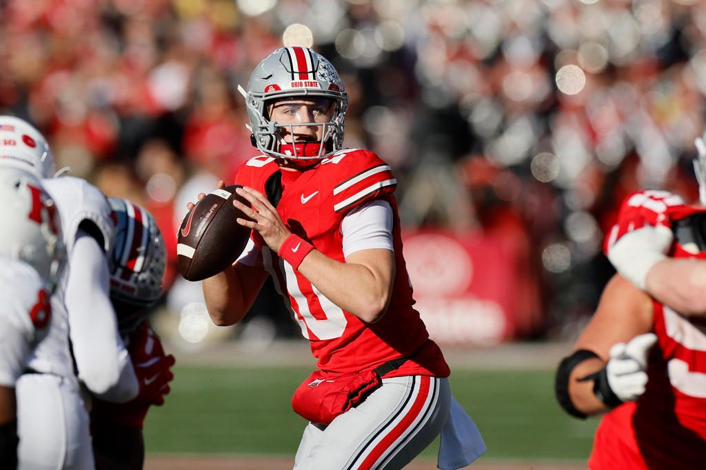 Ohio State quarterback Julian Sayin drops back to pass against Rutgers during the second half of an NCAA college football game, Saturday, Nov. 22, 2025, in Columbus, Ohio. (AP Photo/Jay LaPrete)