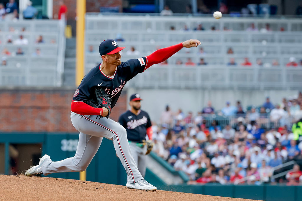 Washington Nationals pitcher Foster Griffin delivers to an Atlanta Braves batter during the first inning of a baseball game, Friday, July 31, 2026, in Atlanta. (AP Photo/Erik S. Lesser)