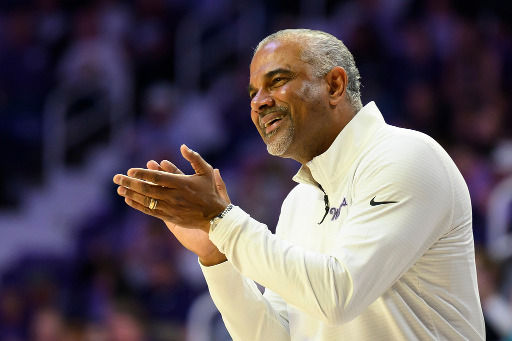 FILE - Kansas State head coach Jerome Tang cheers on his team during the first half of an NCAA college basketball game against Iowa State in Manhattan, Kan., Saturday, March 8, 2025. (AP Photo/Reed Hoffmann, File)