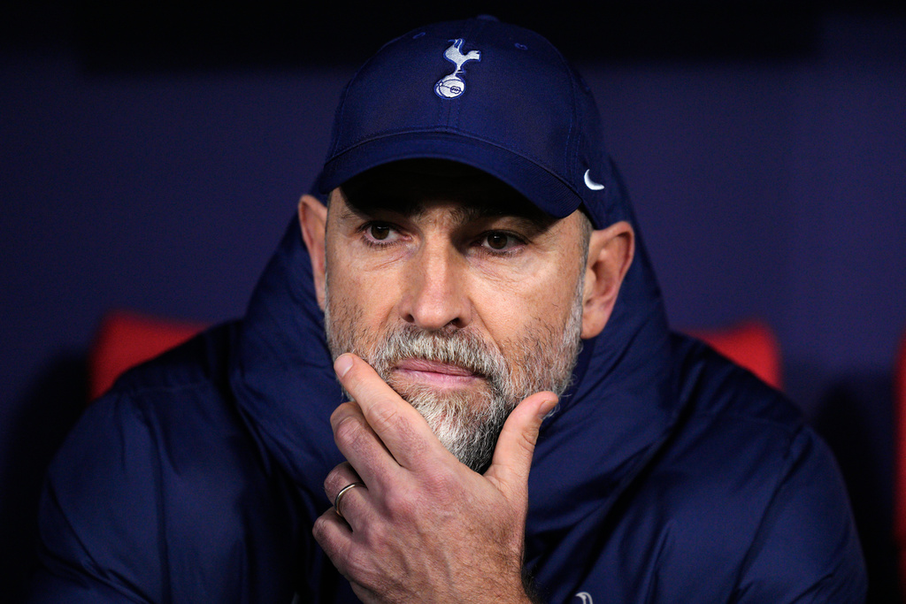 Tottenham's head coach Igor Tudor looks out from the bench prior to the first leg of the Champions League round of 16 soccer match between Atletico Madrid and Tottenham in Madrid, Spain, Tuesday, March 10, 2026. (AP Photo/Jose Breton)