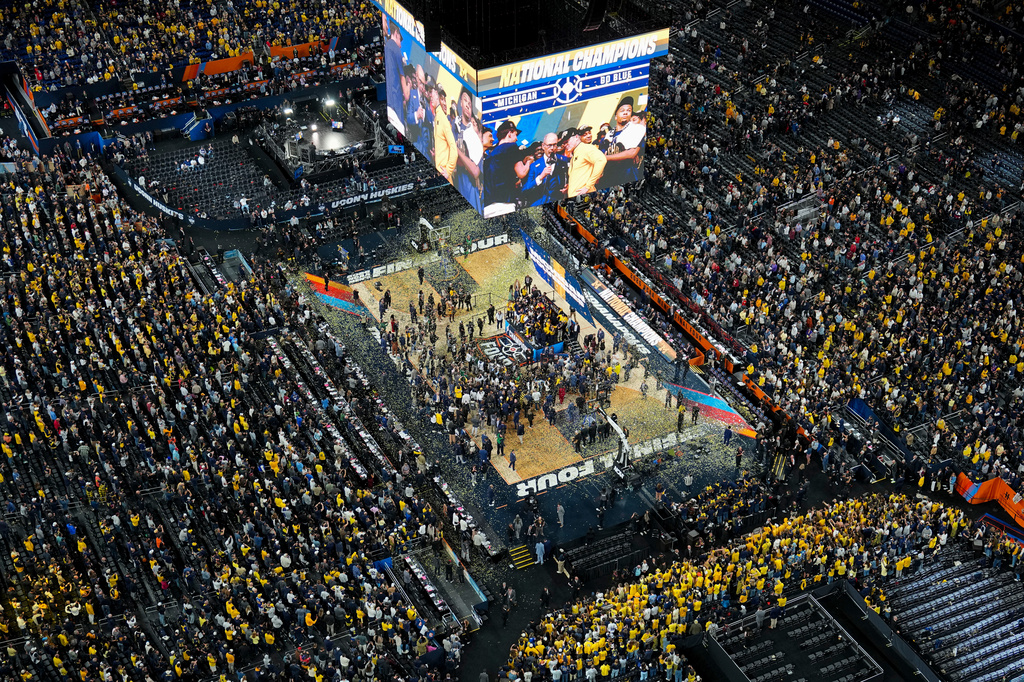 FILE - Michigan celebrates after defeating UConn in the NCAA college basketball tournament national championship game at the Final Four, April 6, 2026, in Indianapolis. (AP Photo/AJ Mast, File)