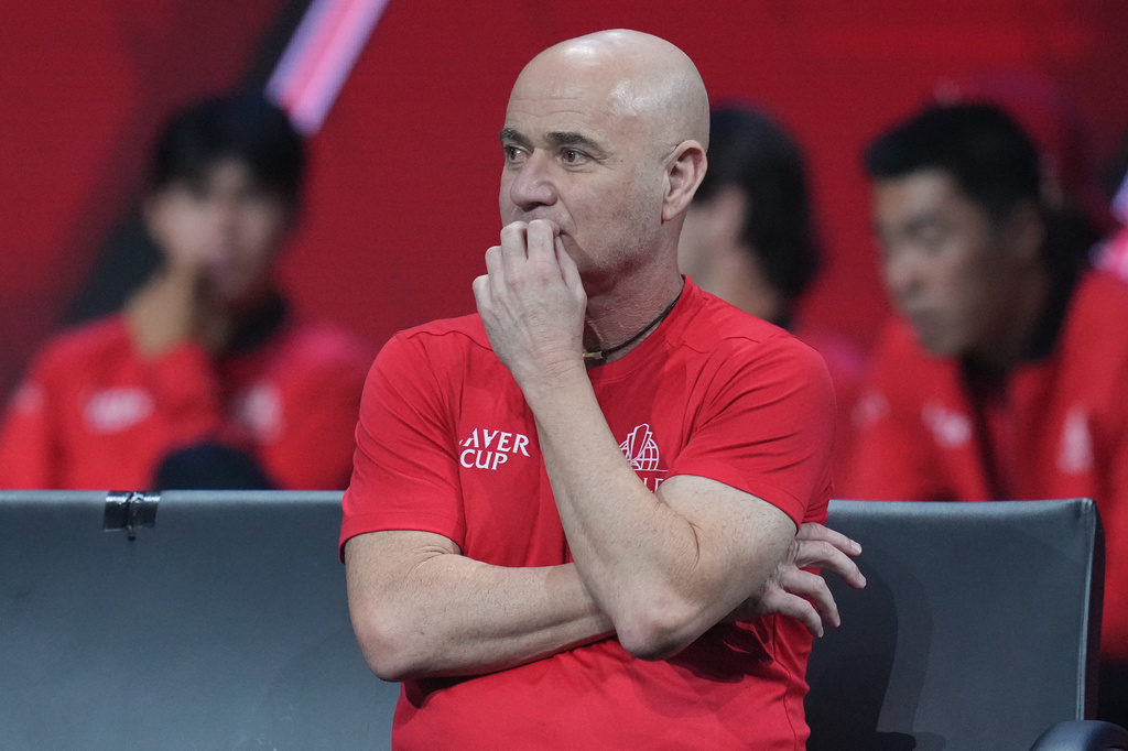 Team World's captain Andre Agassi watches Team World's Francisco Cerundolo play against Team Europe's Casper Ruud during a Laver Cup tennis tournament match in London, Friday, Sept. 25, 2026. (AP Photo/Maja Smiejkowska)
