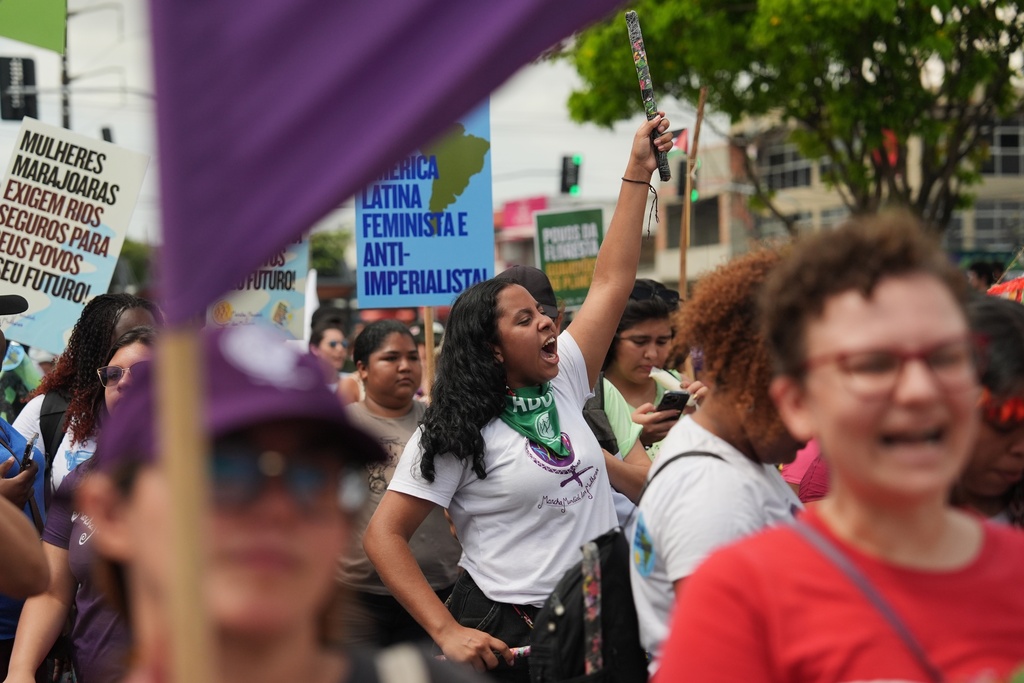 Activists participate in a climate protest during the COP30 U.N. Climate Summit, Saturday, Nov. 15, 2025, in Belem, Brazil. (AP Photo/Joshua A. Bickel)